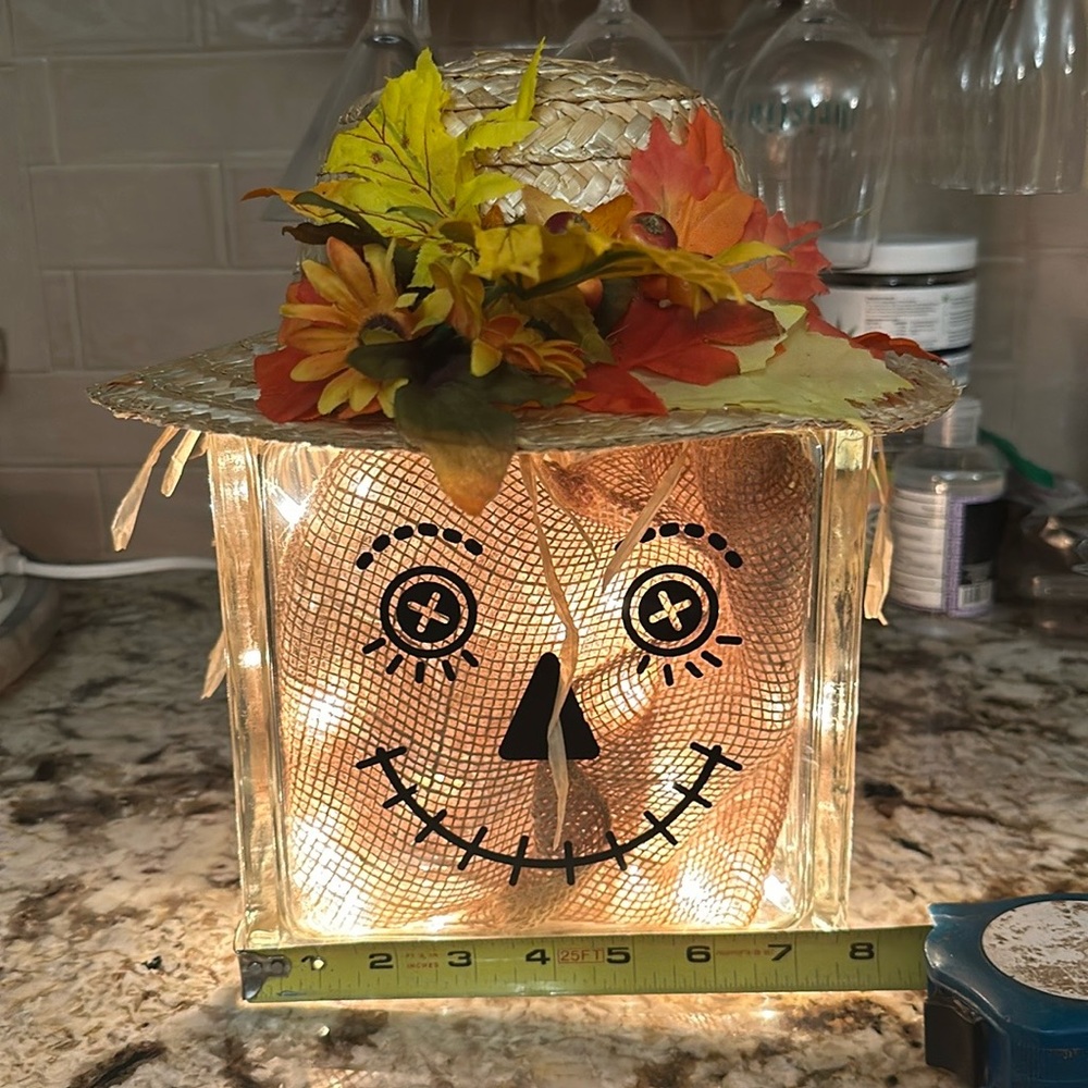 Glass block scarecrow